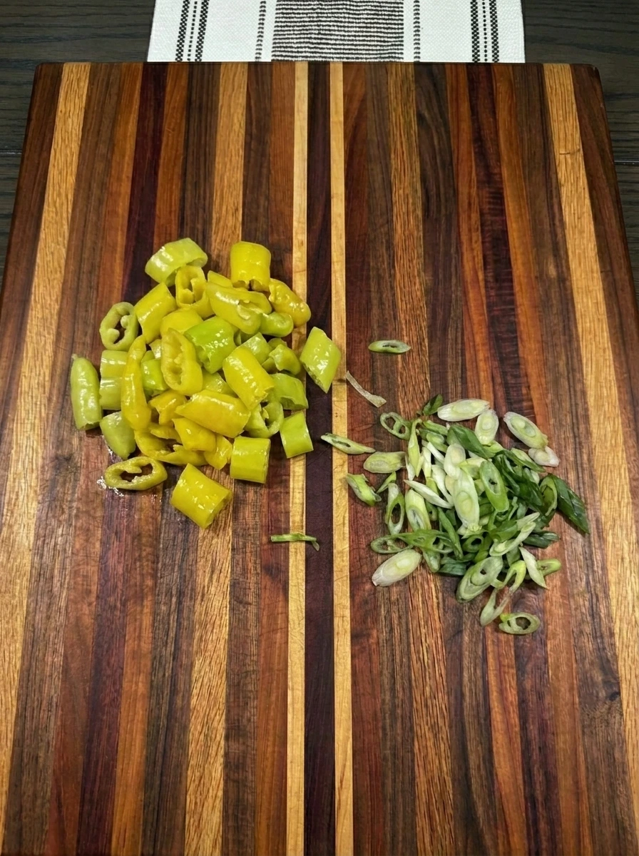 Chopped banana peppers and green onions for Banana Pepper Egg Bites