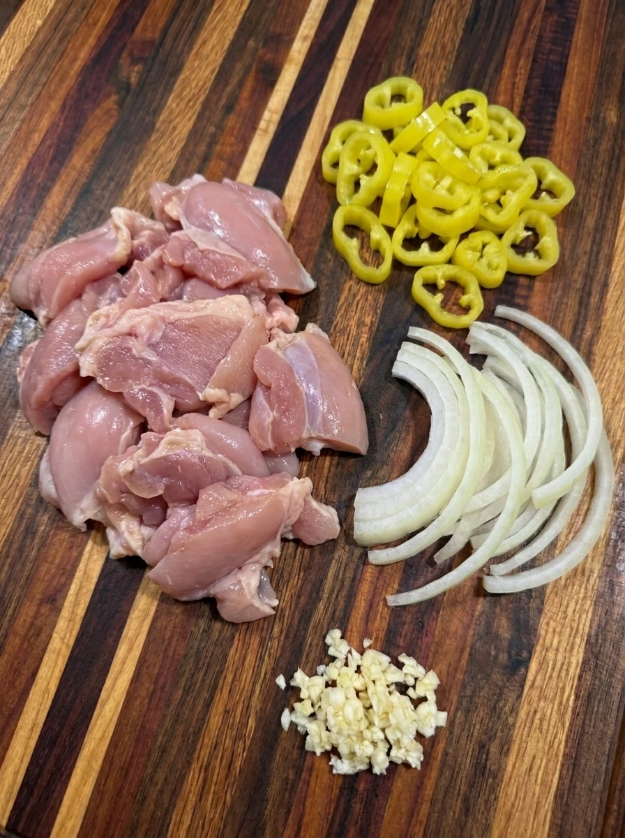Sliced chicken banana peppers and onions for Banana Pepper Rice Bowls