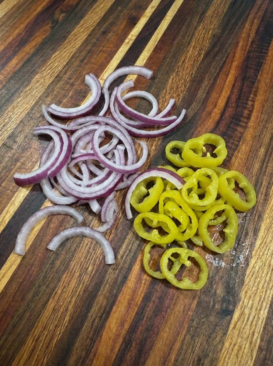 Sliced onion and drained banana peppers for Crispy Banana Pepper Quesadillas