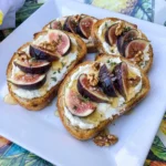Fig Breakfast Toast with ricotta honey walnuts and fresh figs on crisp browned bread