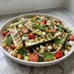 Grilled Zucchini Chickpea Salad with chickpeas feta tomatoes cucumber herbs and lemon dressing