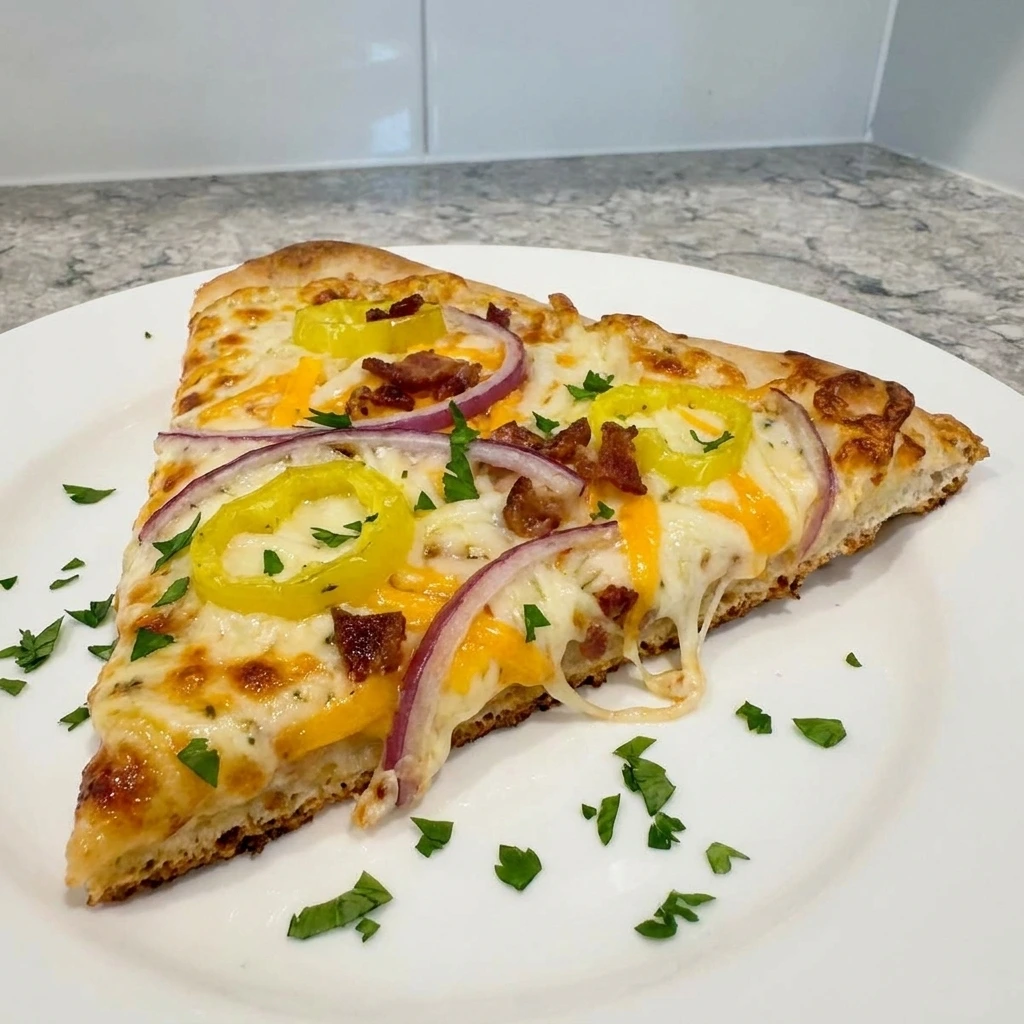 Sliced serving of Loaded Banana Pepper Flatbread