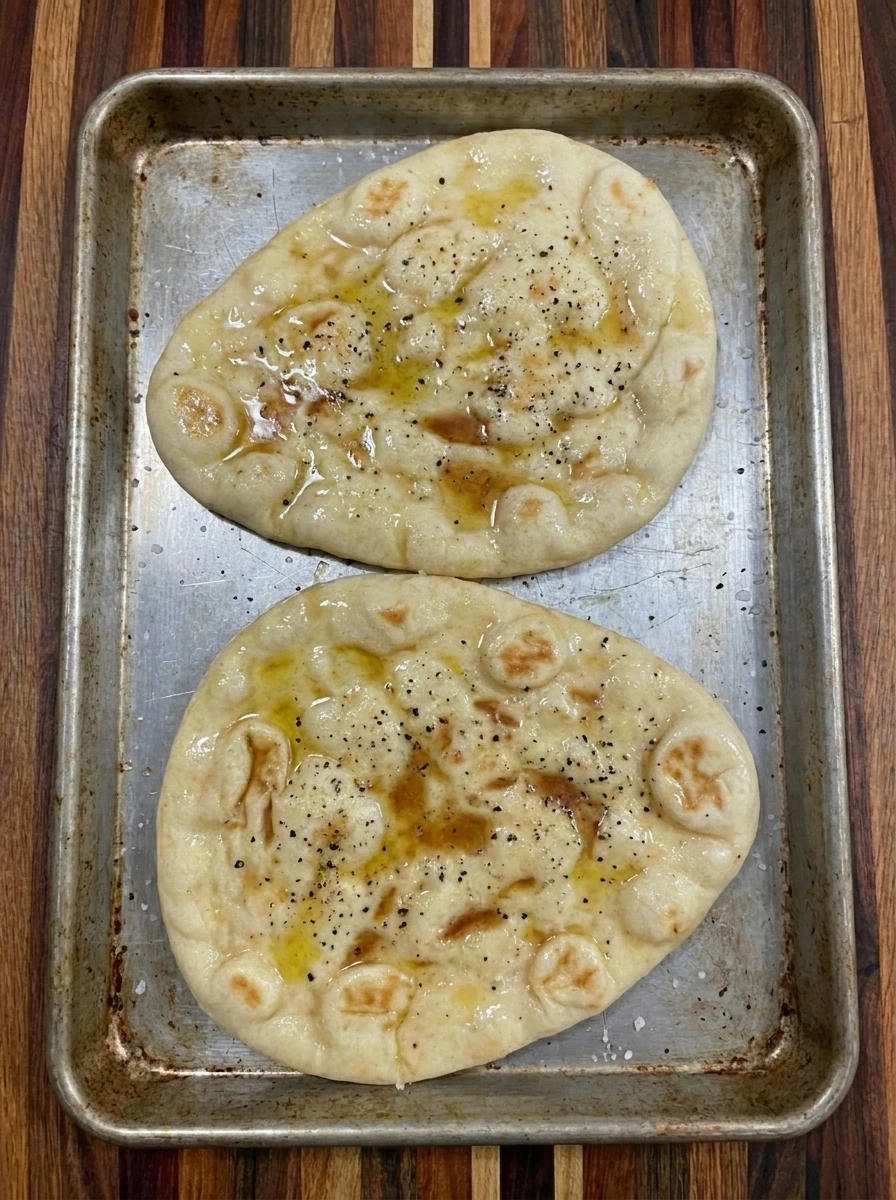 Seasoned flatbread base for Peach Burrata Flatbread