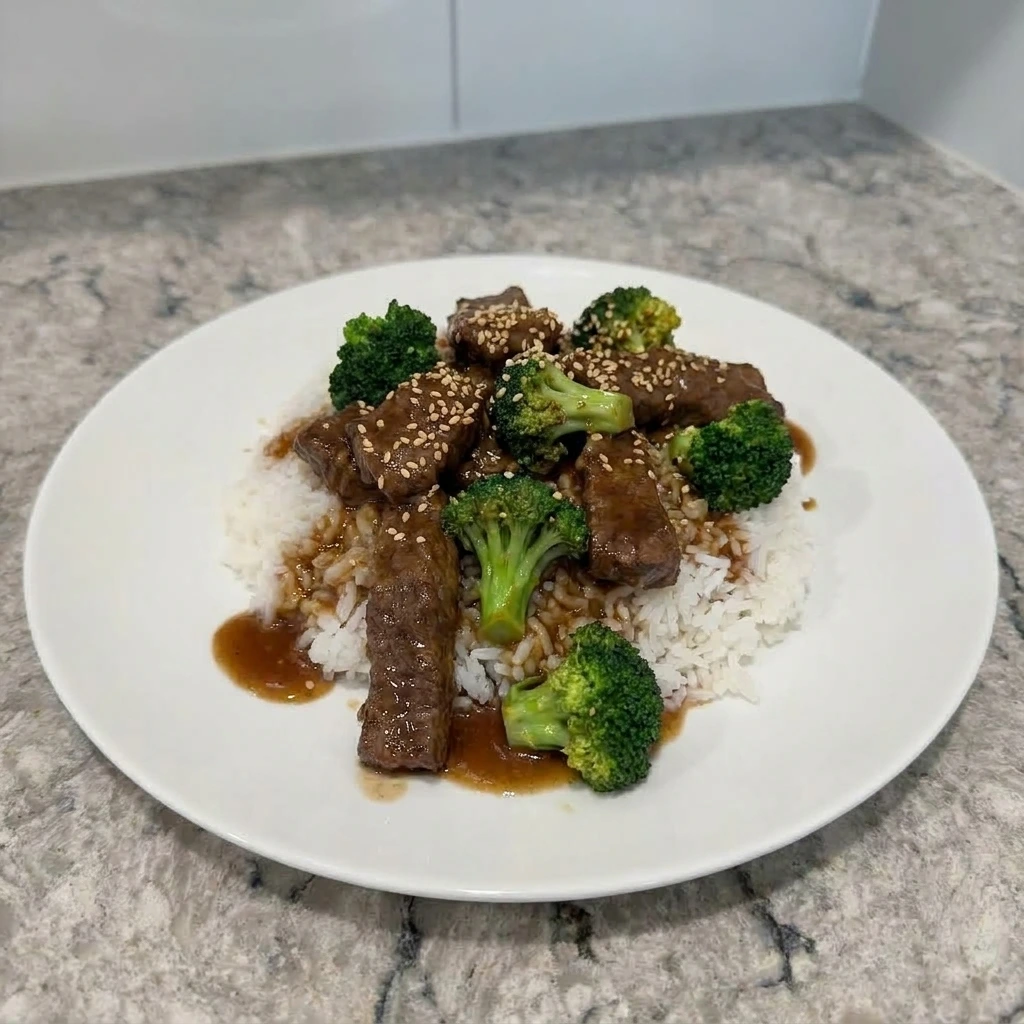 Slow Cooker Beef and Broccoli served over rice