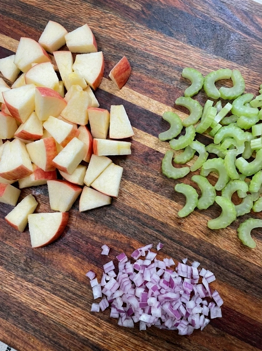 Diced apples sliced celery and red onion for Apple Chicken Salad