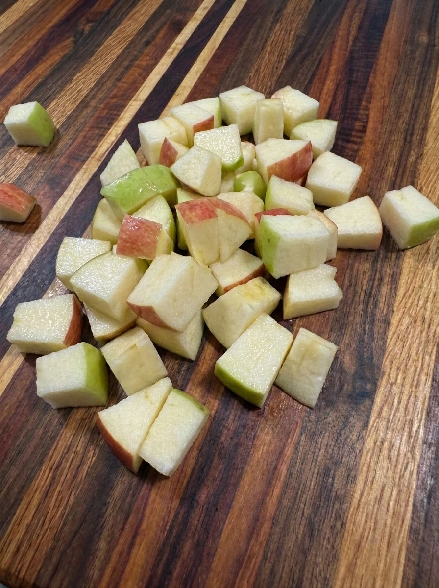 Two apples diced into irregular pieces for Apple Pie Yogurt Parfaits