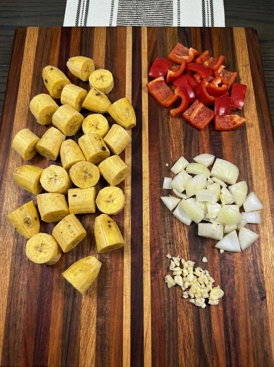 Sliced plantains with chopped pepper onion and garlic