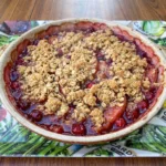 Cranberry Apple Crisp baked with golden oat topping and bubbling fruit