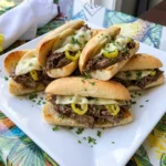 Crockpot Italian Beef Sandwiches with shredded beef and melted provolone