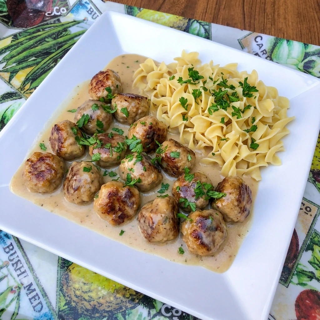 Crockpot Swedish Meatballs in creamy gravy with egg noodles