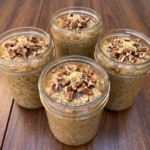 Maple Brown Sugar Overnight Oats in jars with pecans and maple drizzle