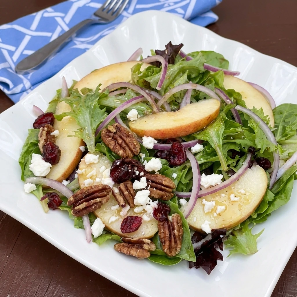 Pecan Apple Salad with apples toasted pecans feta cranberries and greens