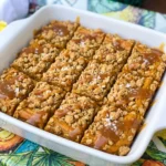 Salted Caramel Pumpkin Bars with pumpkin filling and caramel drizzle