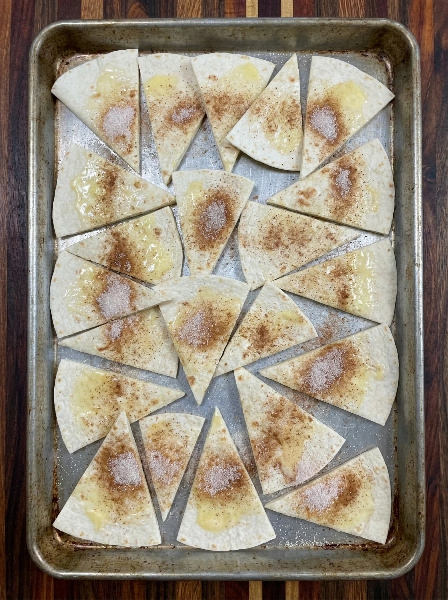 Forty eight tortilla wedges coated with butter and cinnamon sugar