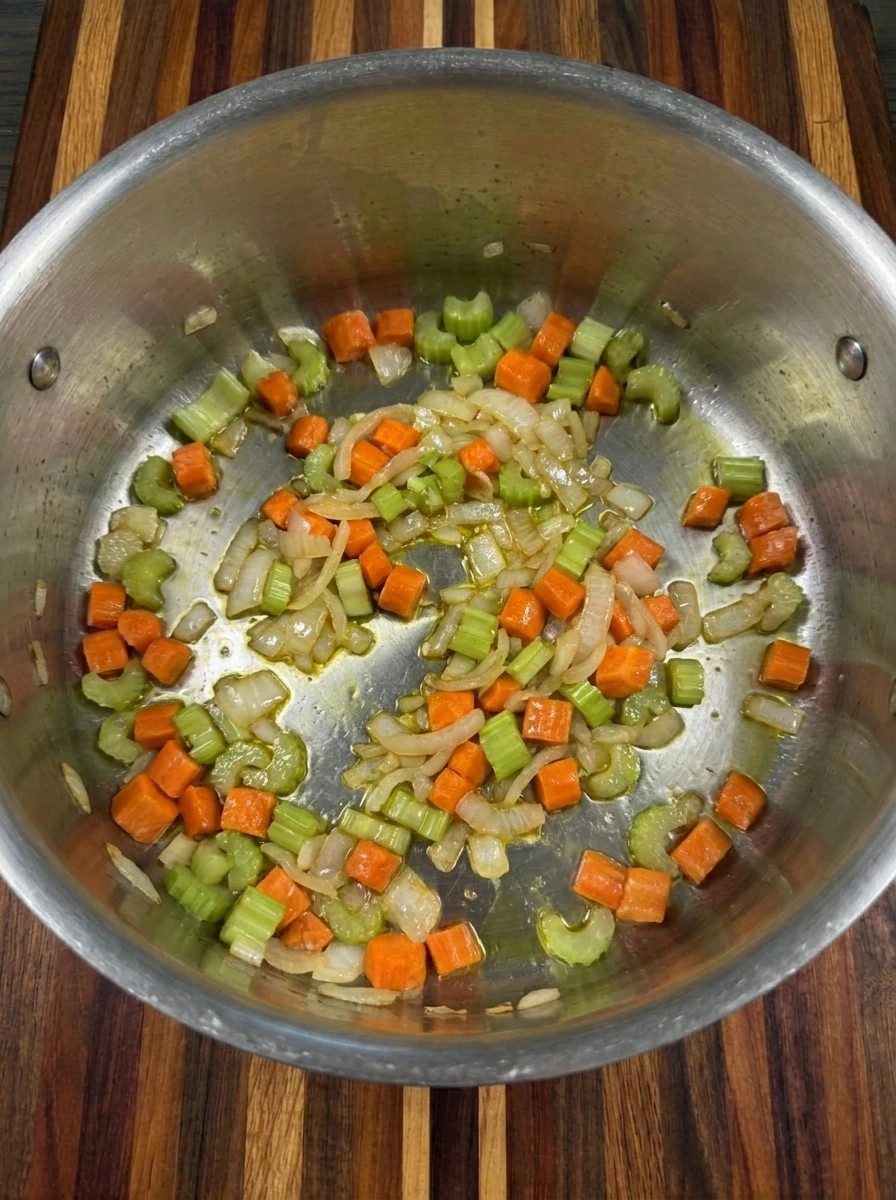 Softened carrots celery and onion for Chicken Pastina Soup