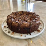 Classic Fudge & Crunch Cake with fudgy chocolate crumb and crunchy pecan topping