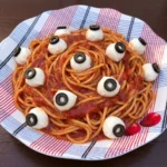 Bloody Spaghetti with Mozzarella Eyeballs in red tomato sauce