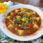 Hearty Cowboy Soup with ground beef potatoes beans corn and vegetables