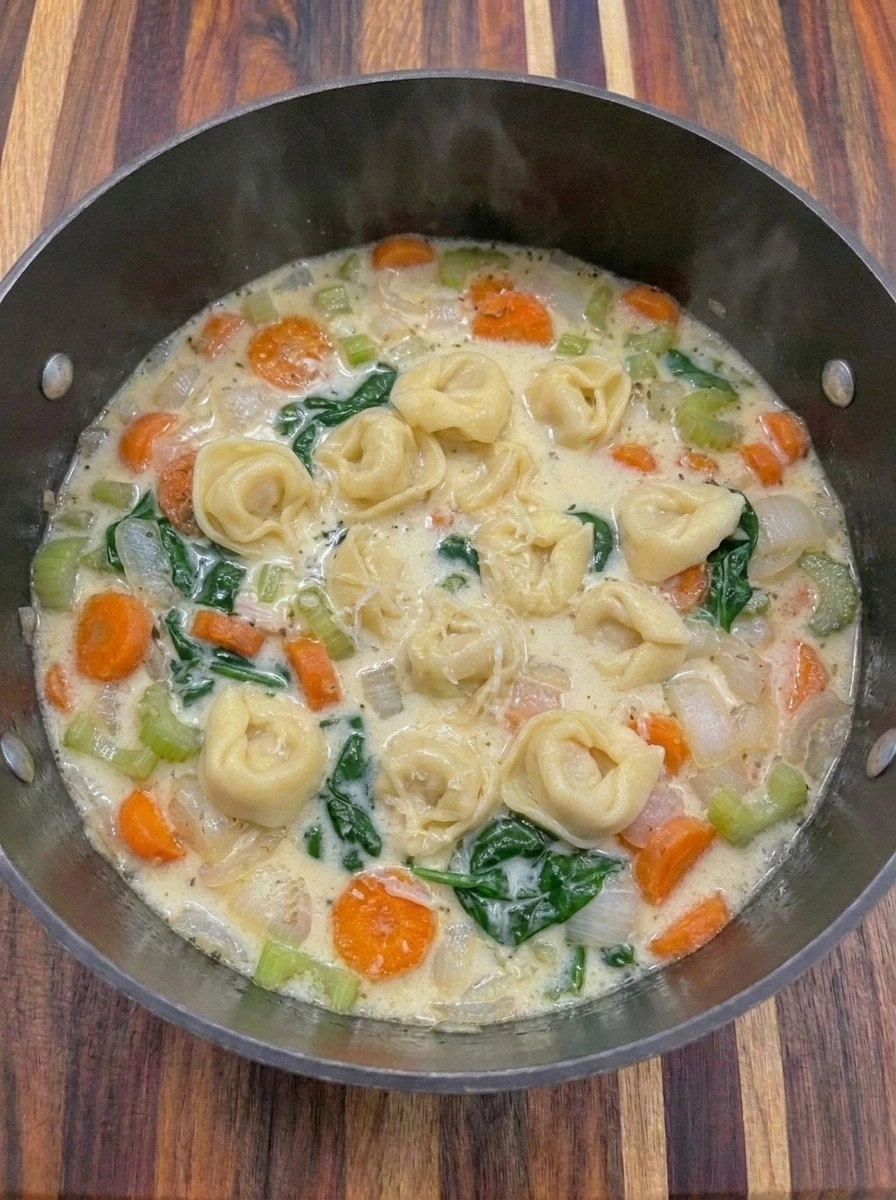Cream and spinach added to Creamy Chicken Tortellini Soup
