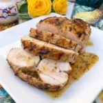 Maple-Glazed Turkey Breast with glossy maple herb crust and juicy slices