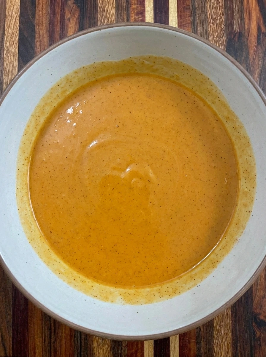 Pumpkin custard mixed for Pumpkin Cinnamon Roll Casserole