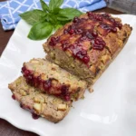 Turkey Stuffing Meatloaf with cranberry topping and sliced moist interior