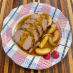 Apple Cider Pork Roast with tender sliced pork and softened apples in cider juices