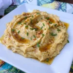 Creamy Brown Butter Garlic Mashed Potatoes with browned butter and chopped chives