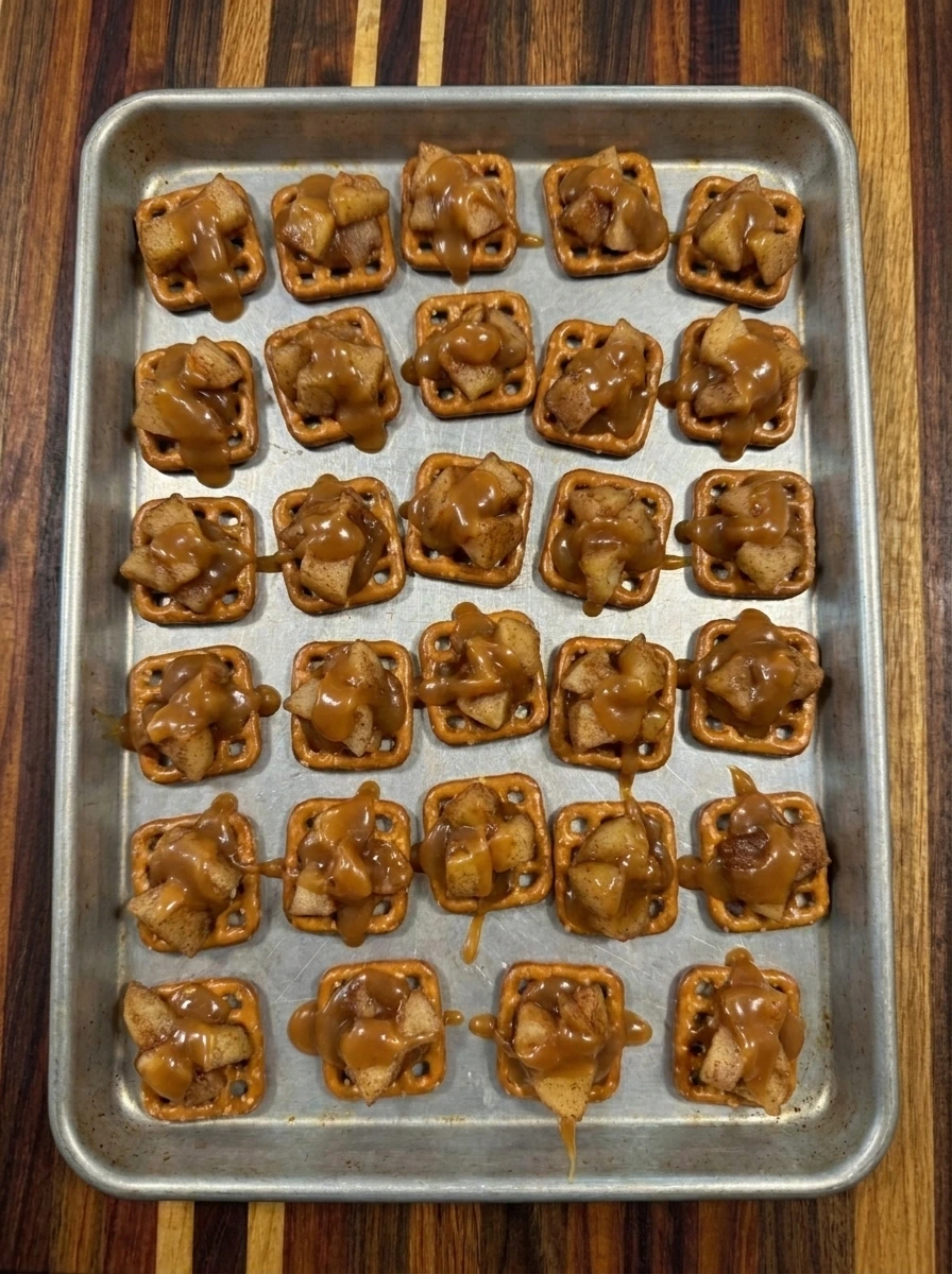 Caramel Apple Pretzel Bites assembled on a baking tray