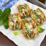 Chicken Caesar Garlic Bread Subs with golden garlic bread and chicken and romaine