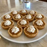 Pumpkin Pie Cookies with creamy pumpkin centers and whipped cream